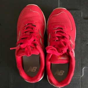 New Balance 574, red leather, women’s size 5.